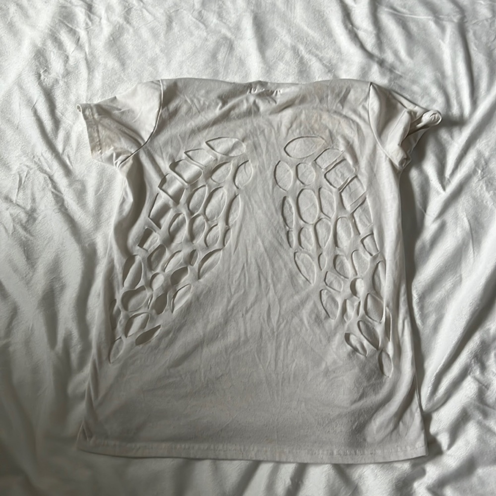 Off white, with eagle wings cut out